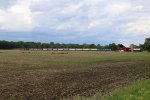 GLC 385 & 390 leads their train south through the farms of eastern Michigan